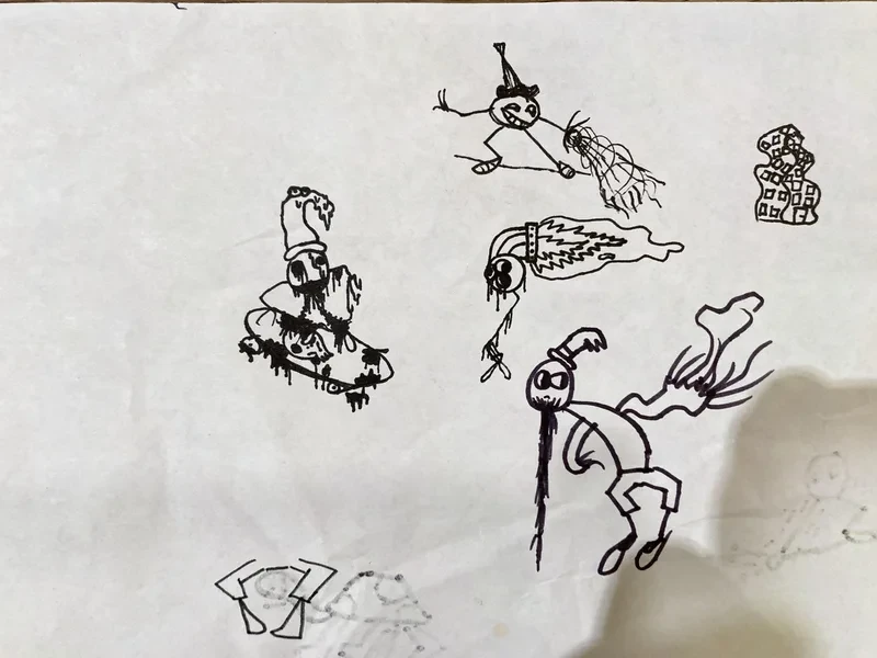 Black pen creature sketches