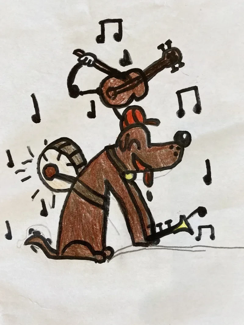 Brown dog playing music