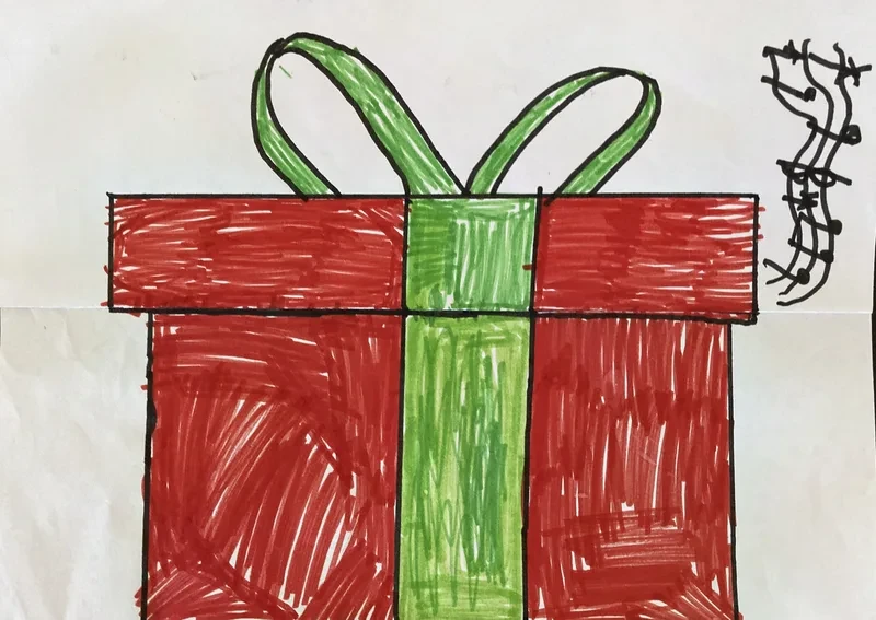Red gift box with green ribbon