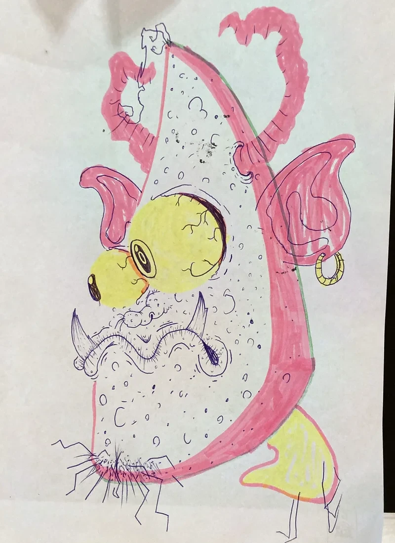Pink fish monster with yellow eyes
